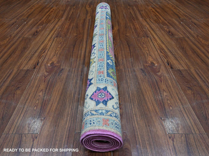 Pink 5'0" x 6'9" Tribal Hand knotted Wool Rug - Sku: O089338