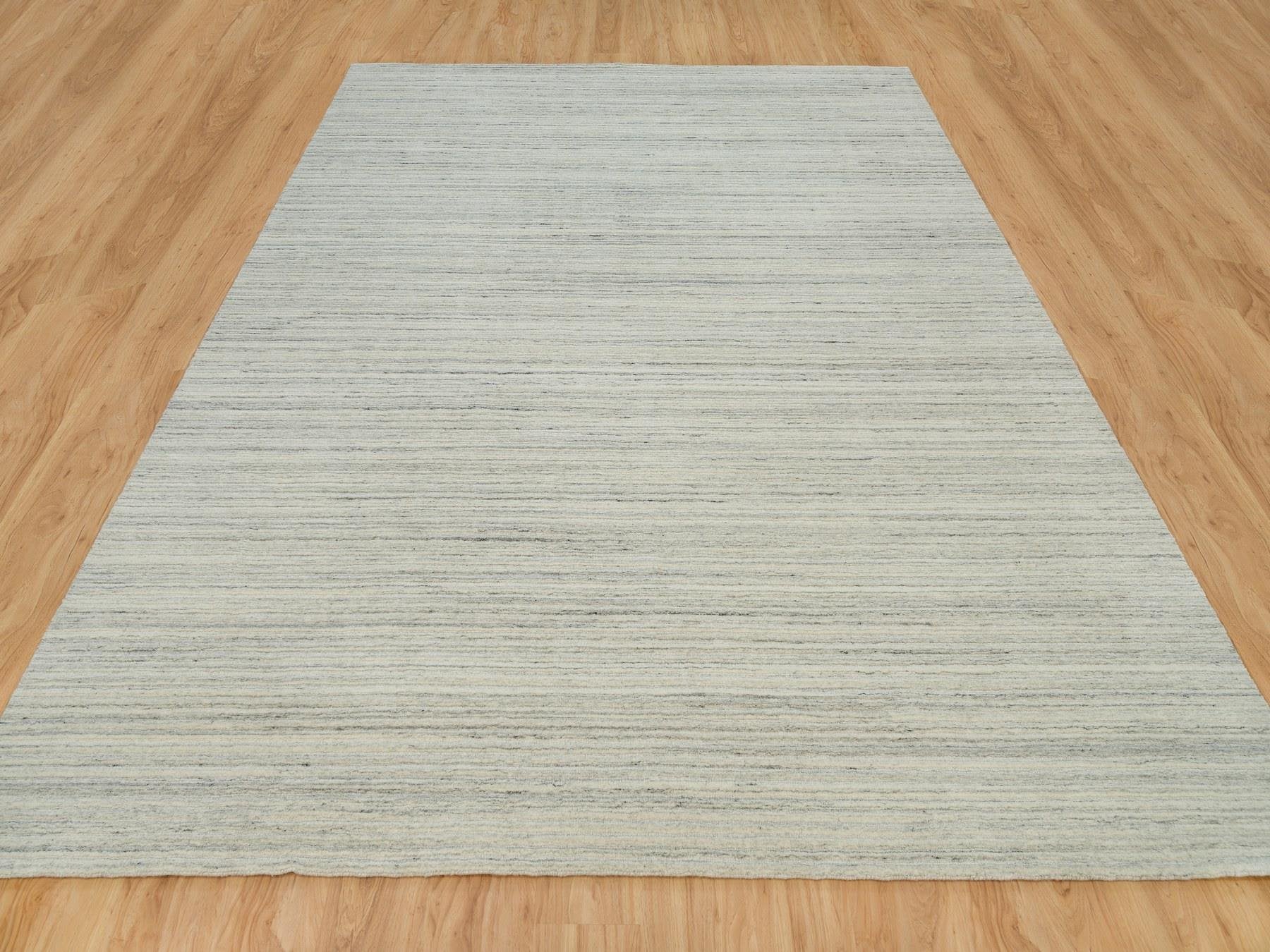 Modern / Contemporary hand-knotted wool rug in Ivory, 9'1" x 11'11" — SKU O090126 (view 2)