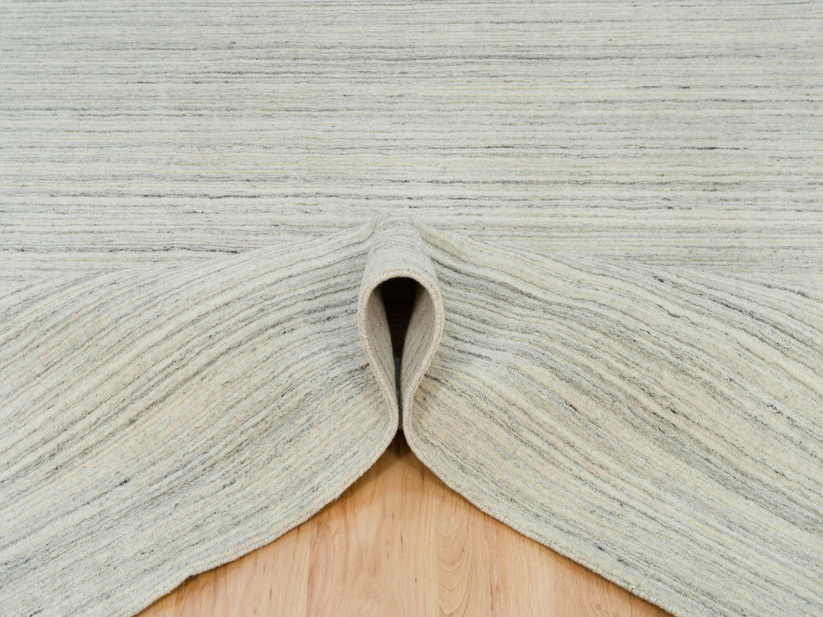 Modern / Contemporary hand-knotted wool rug in Ivory, 9'1" x 11'11" — SKU O090126 (view 5)