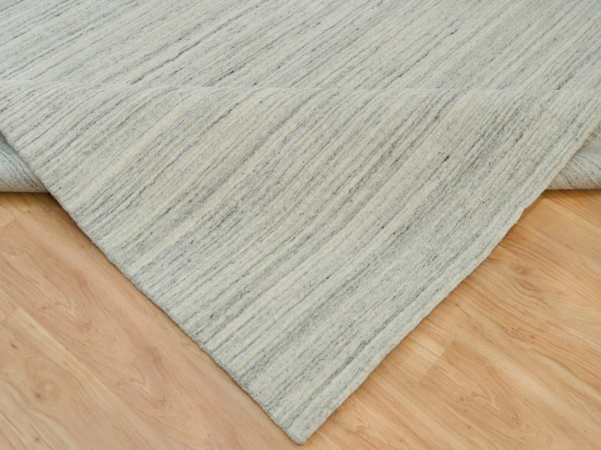 Modern / Contemporary hand-knotted wool rug in Ivory, 9'1" x 11'11" — SKU O090126 (view 6)
