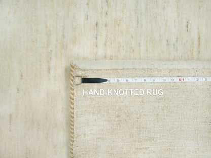 Ivory 5'0" x 6'8" Modern and Contemporary Hand knotted Wool Rug - Sku: O090568