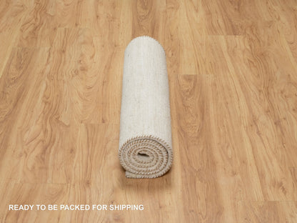 Ivory 2'6" x 5'10" Modern and Contemporary Hand knotted Wool Rug - Sku: O090772