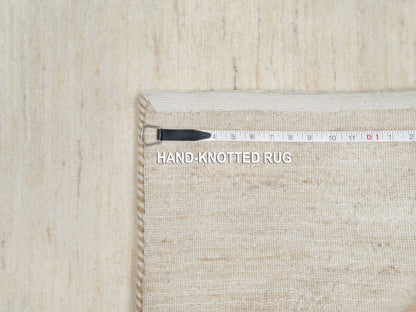 Ivory 2'6" x 5'10" Modern and Contemporary Hand knotted Wool Rug - Sku: O090772