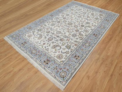 Ivory 5'7" x 9'0" Fine Oriental Hand knotted Wool/Silk Rug - Sku: O091017