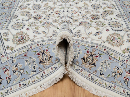 Ivory 5'7" x 9'0" Fine Oriental Hand knotted Wool/Silk Rug - Sku: O091017