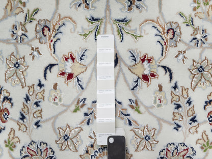 Ivory 5'7" x 9'0" Fine Oriental Hand knotted Wool/Silk Rug - Sku: O091017