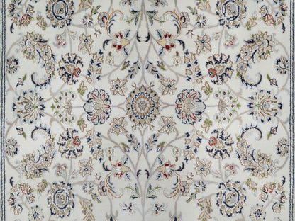 Ivory 5'7" x 9'0" Fine Oriental Hand knotted Wool/Silk Rug - Sku: O091017