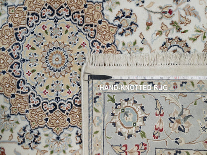 Ivory 5'6" x 5'9" Fine Oriental Hand knotted Wool/Silk Rug - Sku: O091021