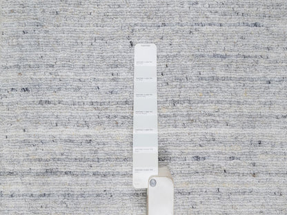 Modern / Contemporary hand-knotted wool rug in Ivory, 2'0" x 3'0", SKU O091203