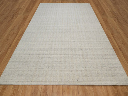 Modern / Contemporary hand-knotted wool rug in Ivory, 8'11" x 12' — SKU O091673 (view 2)
