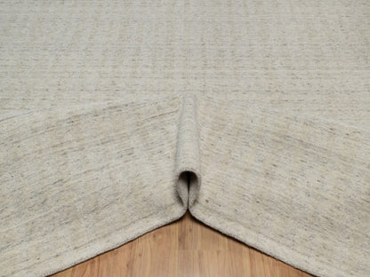 Modern / Contemporary hand-knotted wool rug in Ivory, 8'11" x 12' — SKU O091673 (view 5)