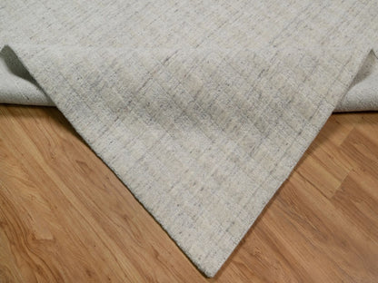 Modern / Contemporary hand-knotted wool rug in Ivory, 8'11" x 12' — SKU O091673 (view 6)