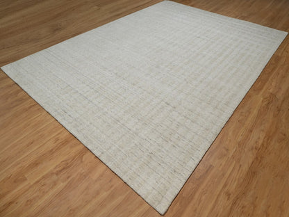Modern / Contemporary hand-knotted wool rug in Ivory, 9'11" x 14' — SKU O091674 (view 3)