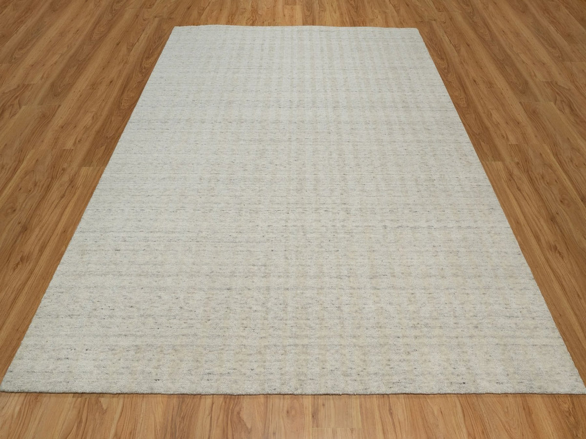 Modern / Contemporary hand-knotted wool rug in Ivory, 8'1" x 10' — SKU O091677 (view 2)