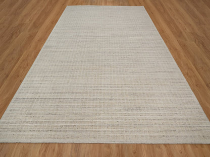 Modern / Contemporary hand-knotted wool rug in Ivory, 10'1" x 14' — SKU O091684 (view 2)