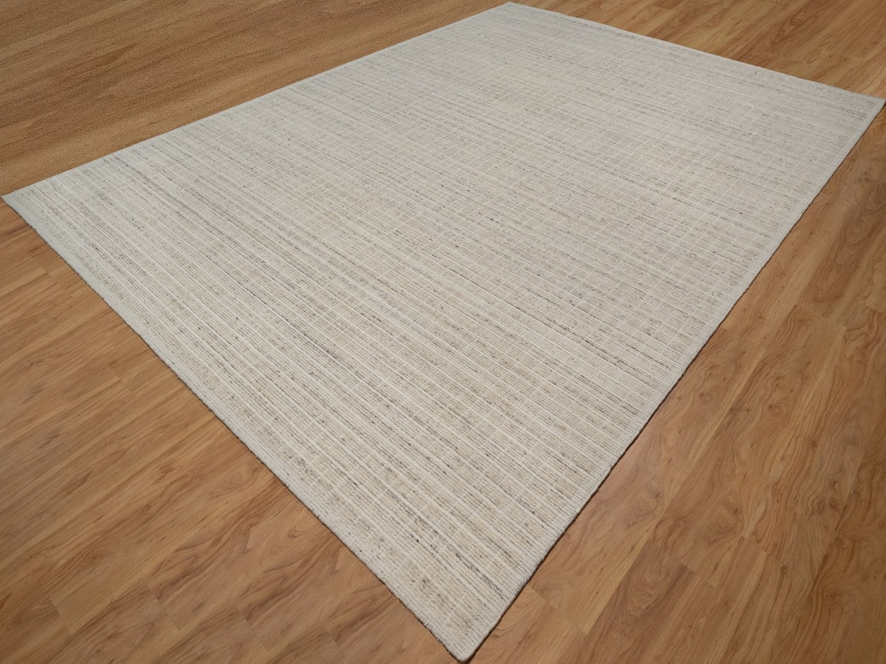 Modern / Contemporary hand-knotted wool rug in Ivory, 10'1" x 14' — SKU O091684 (view 3)
