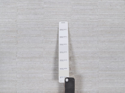 Modern / Contemporary hand-knotted polyester rug in Ivory, 9'1" x 12'1" — SKU O092205 (view 7)