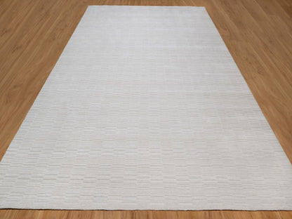 Modern / Contemporary hand-knotted polyester rug in Ivory, 10'1" x 13'11" — SKU O092228 (view 2)
