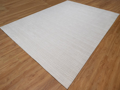Modern / Contemporary hand-knotted polyester rug in Ivory, 10'1" x 13'11" — SKU O092228 (view 3)