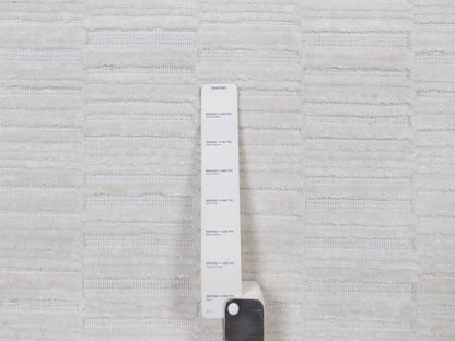 Modern / Contemporary hand-knotted polyester rug in Ivory, 10'1" x 13'11" — SKU O092228 (view 7)