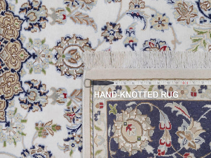 Ivory 5'6" x 8'4" Fine Oriental Hand knotted Wool/Silk Rug - Sku: O092541