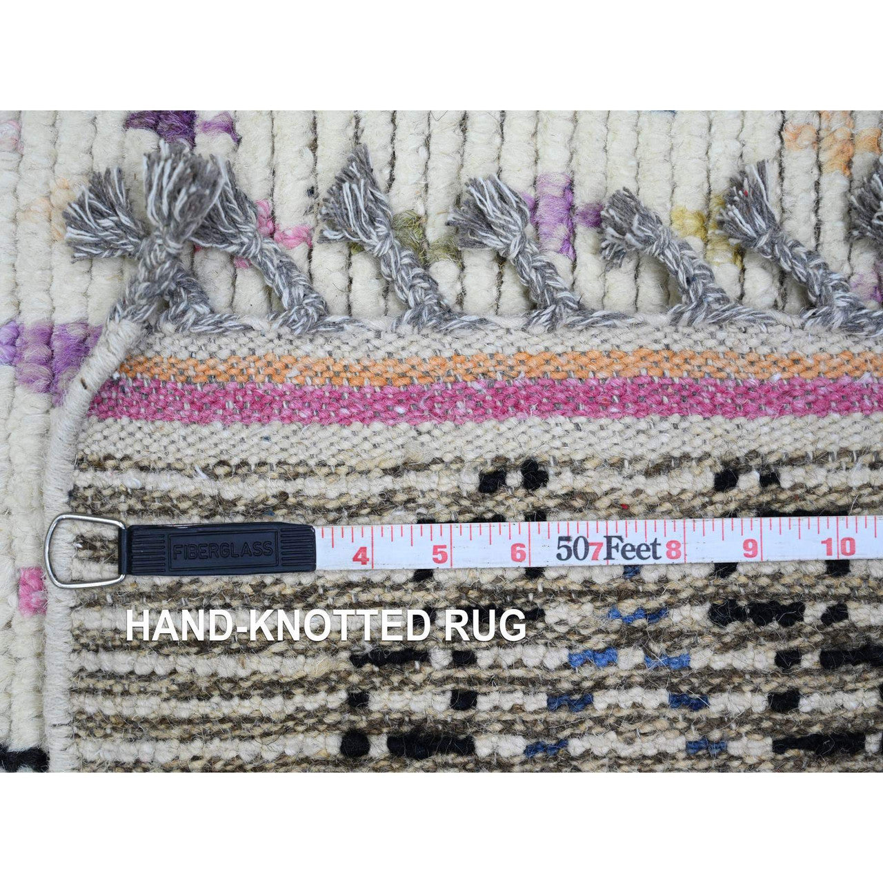 Ivory 5'5" x 8'11" Tribal & Geometric Hand knotted Wool Rug - Sku: O020347